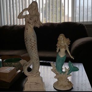 Two ceramic mermaids